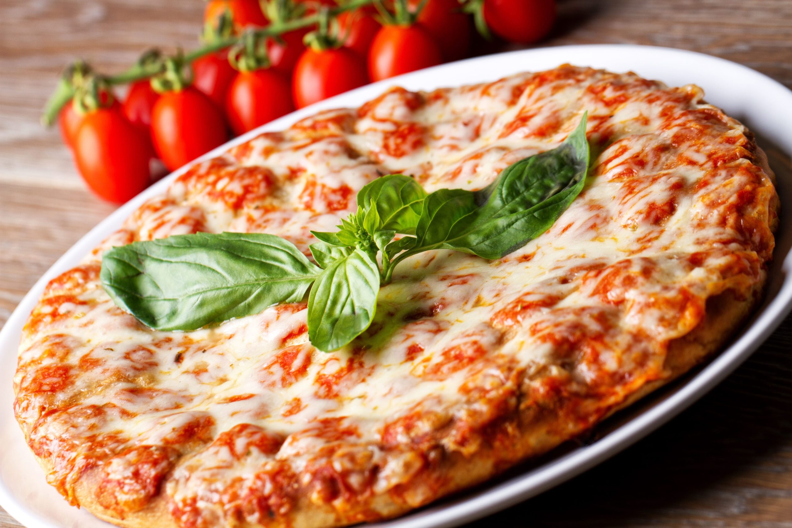 fresh-delicious-pizza-baked-pizza-with-tomato-moz-2022-03-17-23-37-58-utc (1) (1)